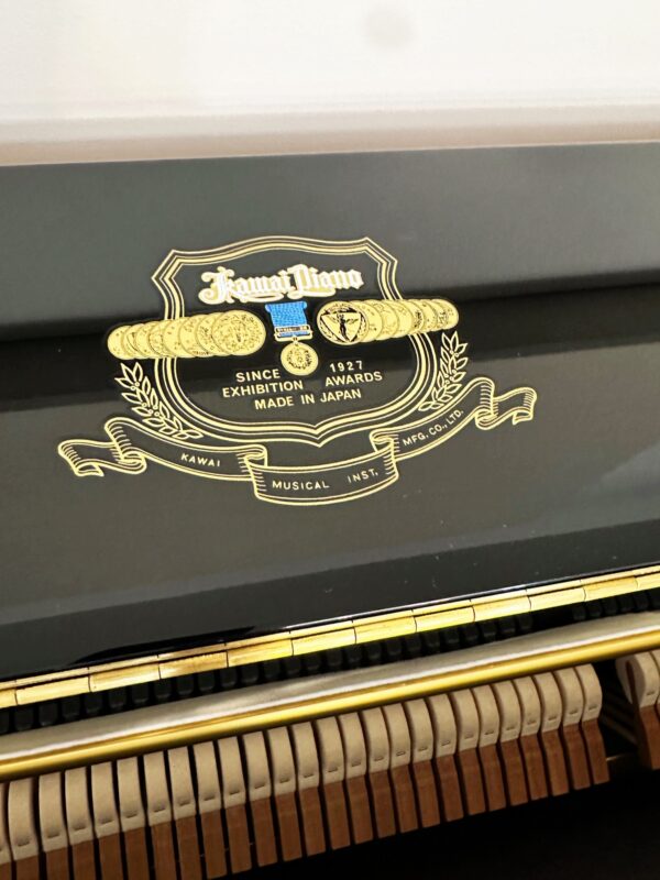 Closeup photo of the Used Kawai Upright K3 Kawai Diana Logo Design